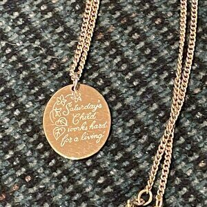 Vintage 1980's Gold Tone AVON necklace SATURDAY'S CHILD WORKS HARD FOR A LIVING